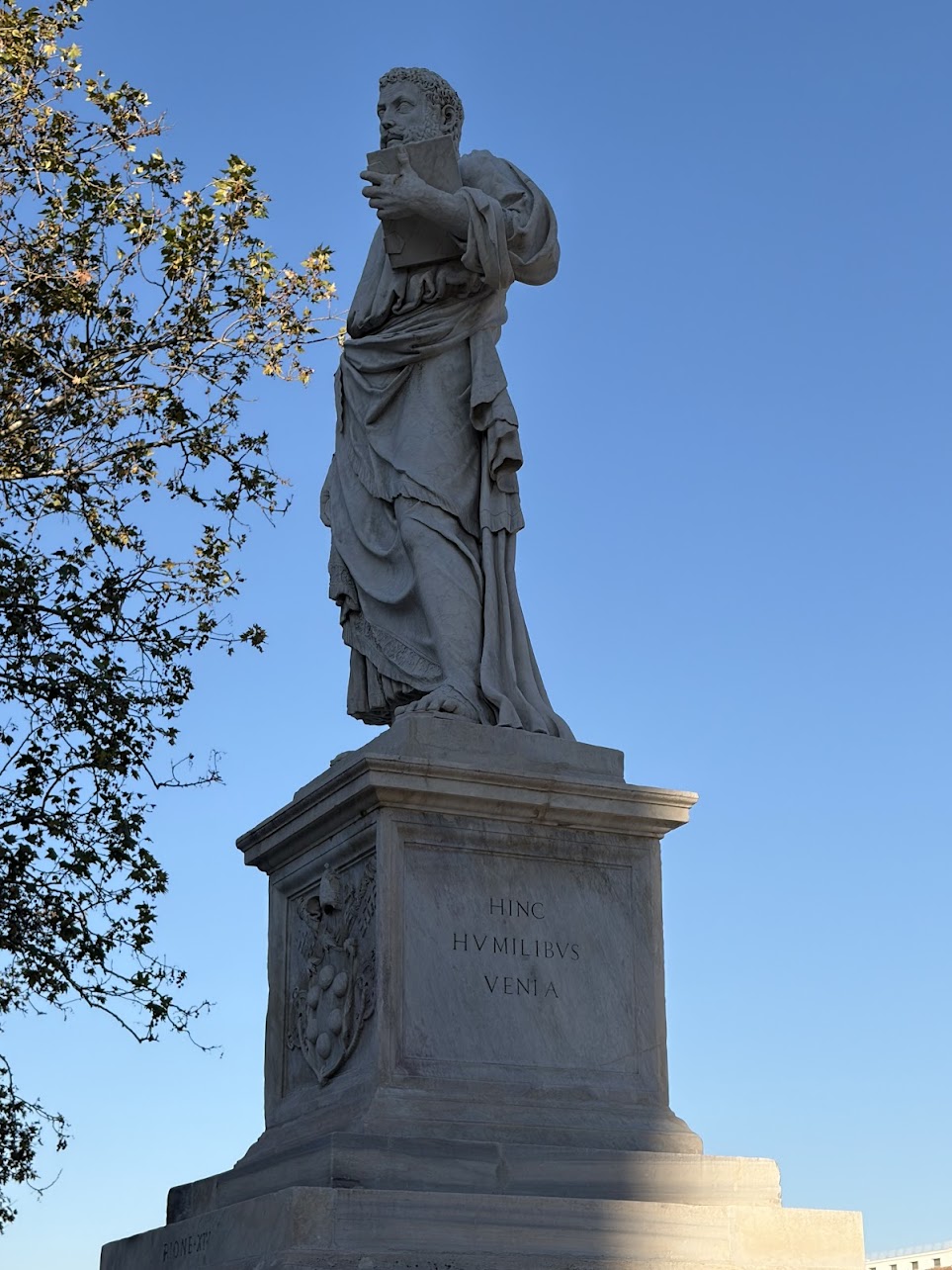 St. Peter statue with Hinc Humilibus Venia inscription